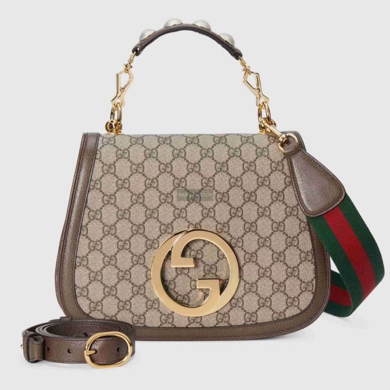 G*u*i top handle bags